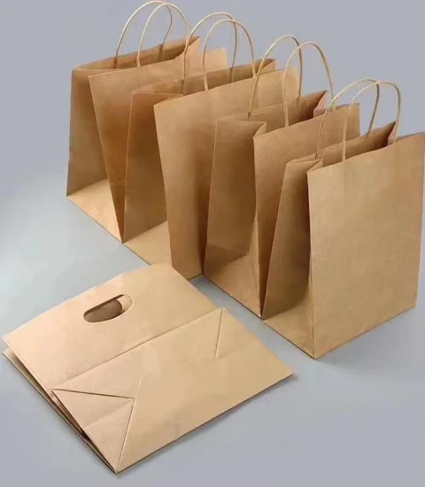 Borsa regalo per borsa da shopping per borsa da imballaggio in carta kraft stampata di lusso personalizzata all'ingrosso con manico in carta ritorta